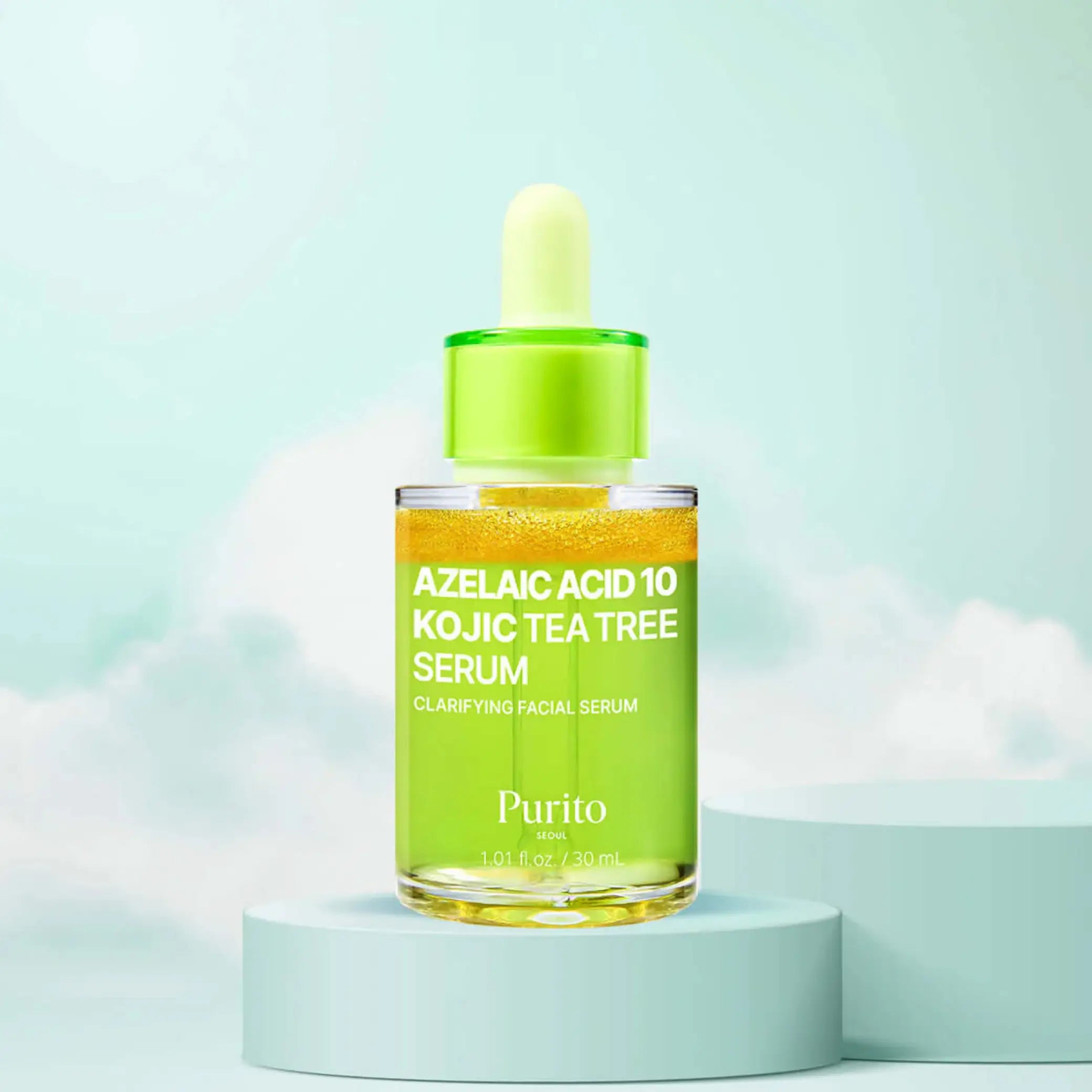 Azelaic Acid 10 Kojic Tea Tree Serum da Purito SEOUL em frasco com conta-gotas sobre base com fundo de céu
